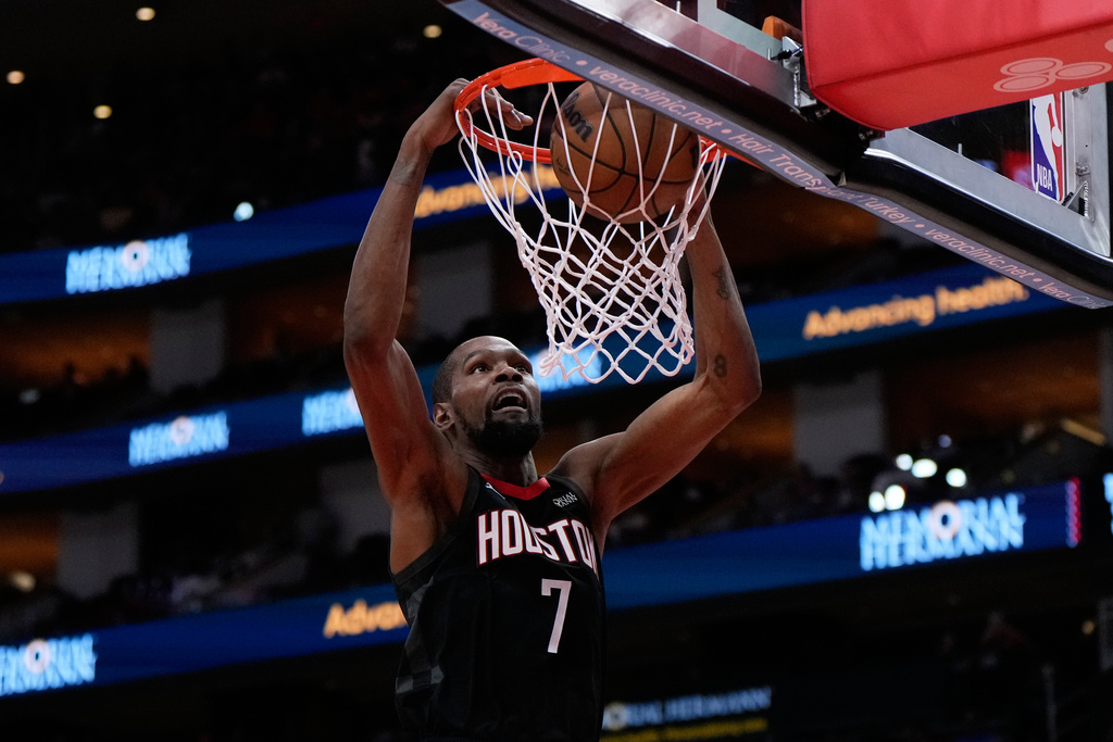 Houston Rockets forward Kevin Durant dunks during the second half of an NBA basketball game against the New Orleans Pelicans in Houston, Friday, March 13, 2026. (AP Photo/Ashley Landis)