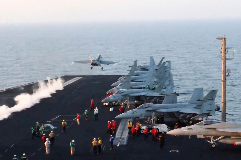 FILE - This image taken from video provided by the U.S. Navy shows an aircraft launching from the USS Harry S. Truman in the Red Sea before airstrikes in Sanaa, Yemen, March 15, 2025. (U.S. Navy via AP, File)