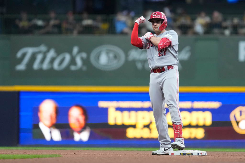 Cincinnati Reds' Sal Stewart gestures after hitting an RBI double during the sixth inning of a baseball game against the Milwaukee Brewers, Tuesday, June 30, 2026, in Milwaukee. (AP Photo/Aaron Gash)