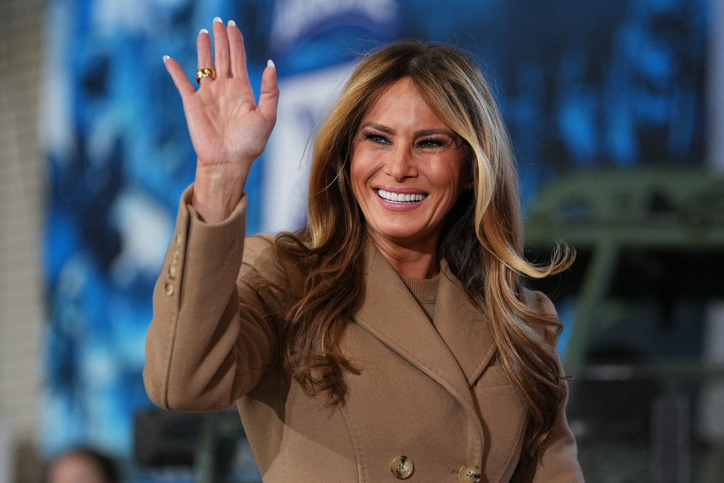 First lady Melania Trump arrives before President Donald Trump speaks to soldiers and their families at Fort Bragg, N.C., Friday, Feb. 13, 2026. (AP Photo/Matt Rourke)