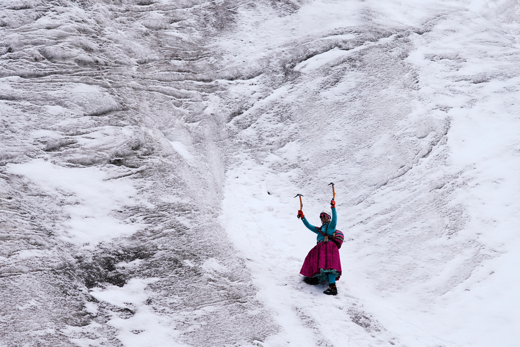 Mountain guide Ana Lia Gonzales climbs the Huayna Potosí glacier near El Alto, Bolivia, Monday, April 14, 2025. (AP Photo/Juan Karita)