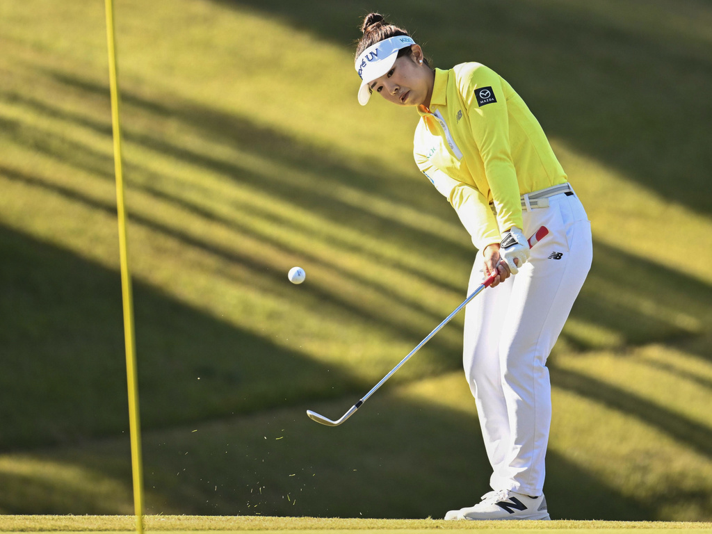 Japan's Miyu Yamashita plays a shot on the third round of the LPGA's Toto Japan Classic in Otsu, Shiga prefecture, Japan Saturday, Nov. 8, 2025. (Kyodo News via AP)