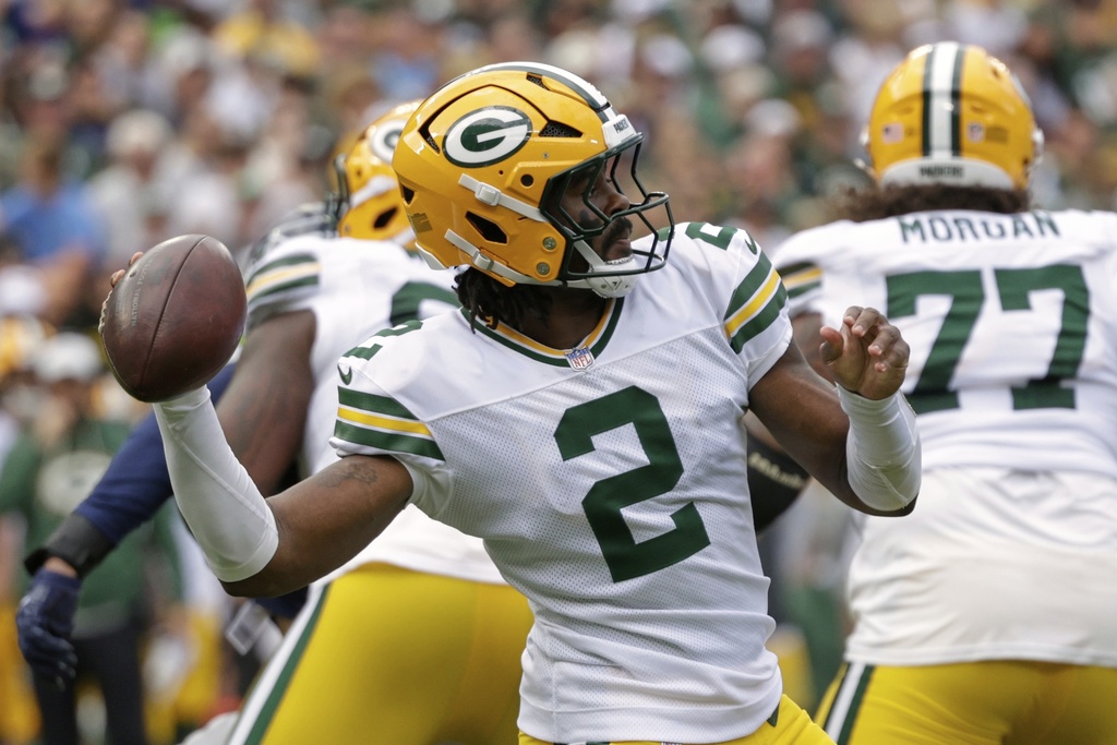 Green Bay Packers' Malik Willis throws during the first half of a preseason NFL football game against the Seattle Seahawks Saturday, Aug. 23, 2025, in Green Bay, Wis. (AP Photo/Matt Ludtke)