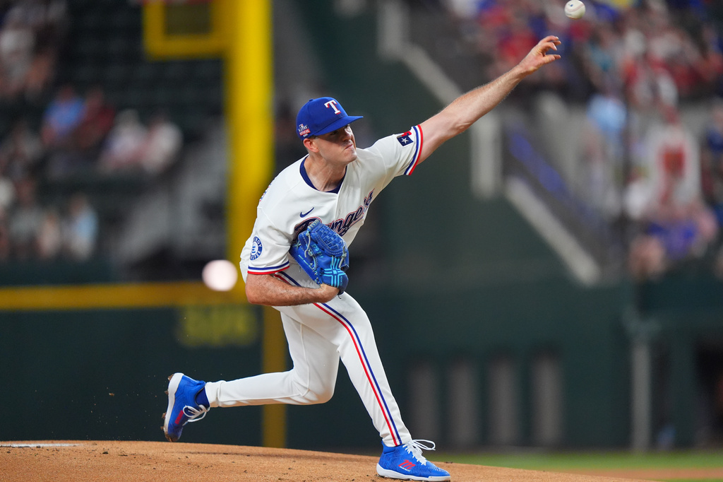 Texas Rangers starting pitcher Cody Bradford throws during the first inning of a baseball game against the Los Angeles Angels, Saturday, Aug. 22, 2026, in Arlington, Texas. (AP Photo/LM Otero)
