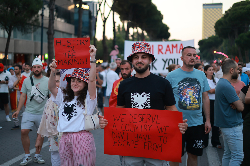 Protesters take part in a rally against a coastal development project in western Albania linked to President Donald Trump's son-in-law Jared Kushner, in Tirana, Albania, Saturday, June 27, 2026. (AP Photo/Hameraldi Agolli)