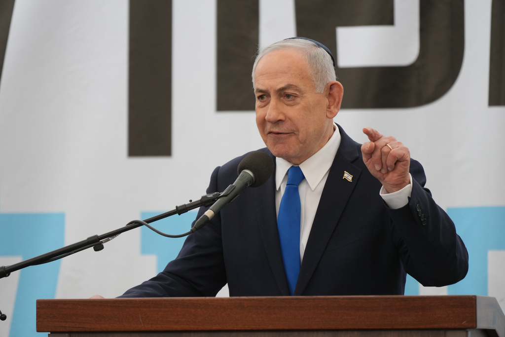 Israeli Prime Minister Benjamin Netanyahu speaks during the funeral of Ran Gvili, the last Israeli hostage whose remains were recovered from the Gaza Strip, in Meitar, Israel, Wednesday, Jan. 28, 2026. (AP Photo/Ariel Schalit)