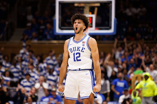 FILE - Duke's Cameron Boozer (12) celebrates after a play during the second half of an NCAA college basketball game against Central Florida in Durham, N.C., Tuesday, Oct. 21, 2025. (AP Photo/Ben McKeown, File) FILE - Duke's Cameron Boozer (12) celebrates after a play during the second half of an NCAA college basketball game against Central Florida in Durham, N.C., Tuesday, Oct. 21, 2025. (AP Photo/Ben McKeown, File)