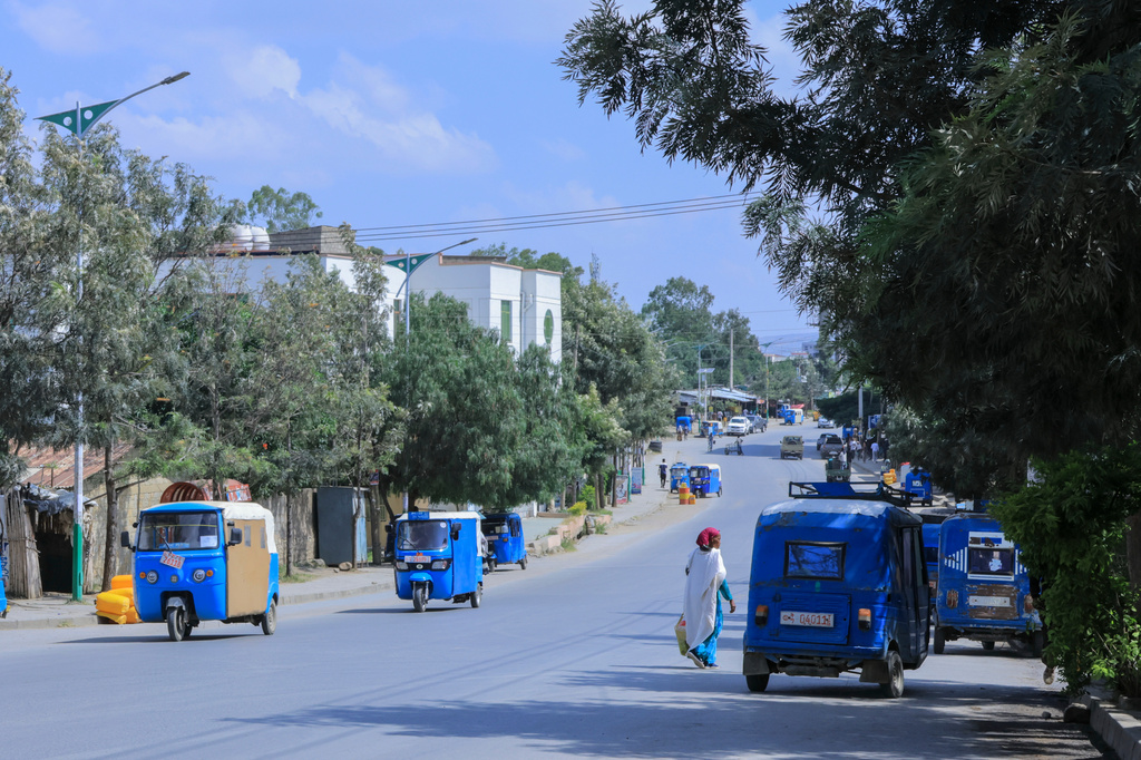 People walk in Mekelle, the capital of Ethiopia's Tigray region, as fighting escalates with the central government, Thursday, Sept. 24, 2026. (AP Photo)