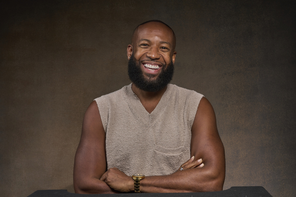 Producer Carlos King poses for a portrait in Los Angeles Friday, Aug. 22, 2025. (AP Photo/Damian Dovarganes)