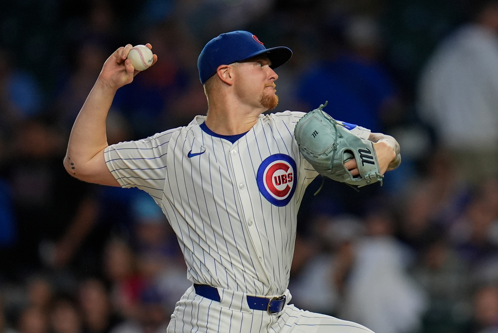Chicago Cubs starting pitcher Cade Horton (22) throws against the New York Mets during the first inning of a baseball game Tuesday, Sept. 23, 2025, in Chicago. (AP Photo/Erin Hooley)