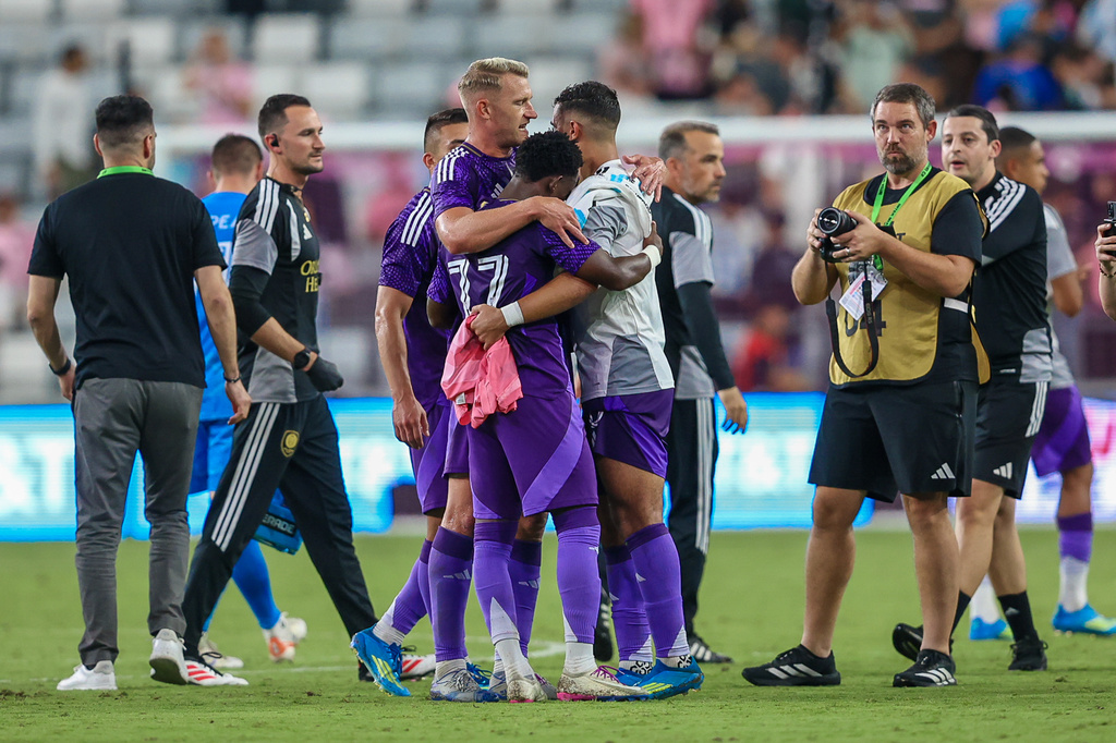 Orlando City players celebrate together at the end of the second half during an MLS soccer match against the Inter Miami, Saturday, May 2, 2026, in Miami. (AP Photo/Chris Arjoon).