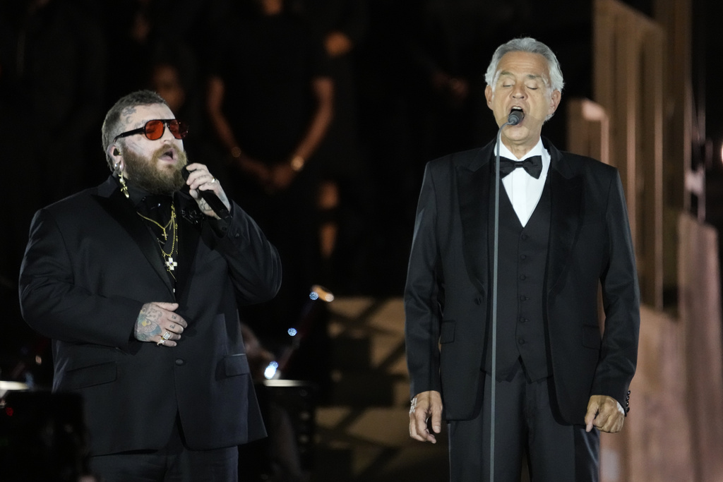Teddy Swims performs with Andrea Bocelli during a concert in St. Peter's Square for the conclusion of the World Meeting on Human Fraternity at the Vatican, Saturday, Sept. 13, 2025. (AP Photo/Gregorio Borgia)