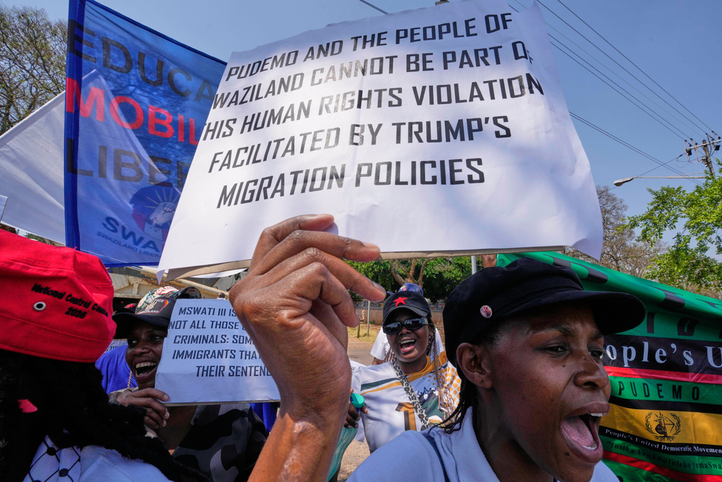 Pro-democracy activists protest outside the U.S. embassy in Pretoria, South Africa, Friday, Sept. 19, 2025. (AP Photo/Themba Hadebe)