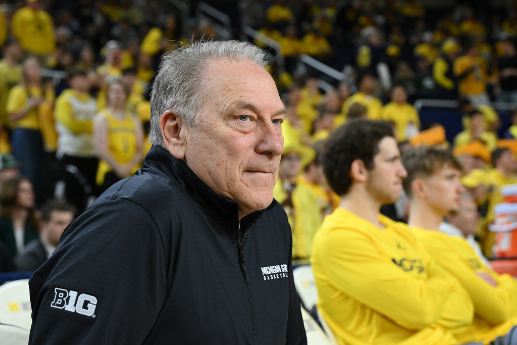Michigan State head coach Tom Izzo watches his team from the bench during their warmups before their NCAA college basketball game against Michigan in Ann Arbor, Mich., Sunday, March 8, 2026. (AP Photo/Lon Horwedel)