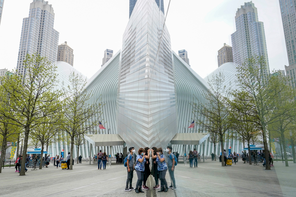 FILE - Visitors peek into the museum at the 9/11 Museum and Memorial, April 29, 2021, in New York. (AP Photo/Mary Altaffer, File)