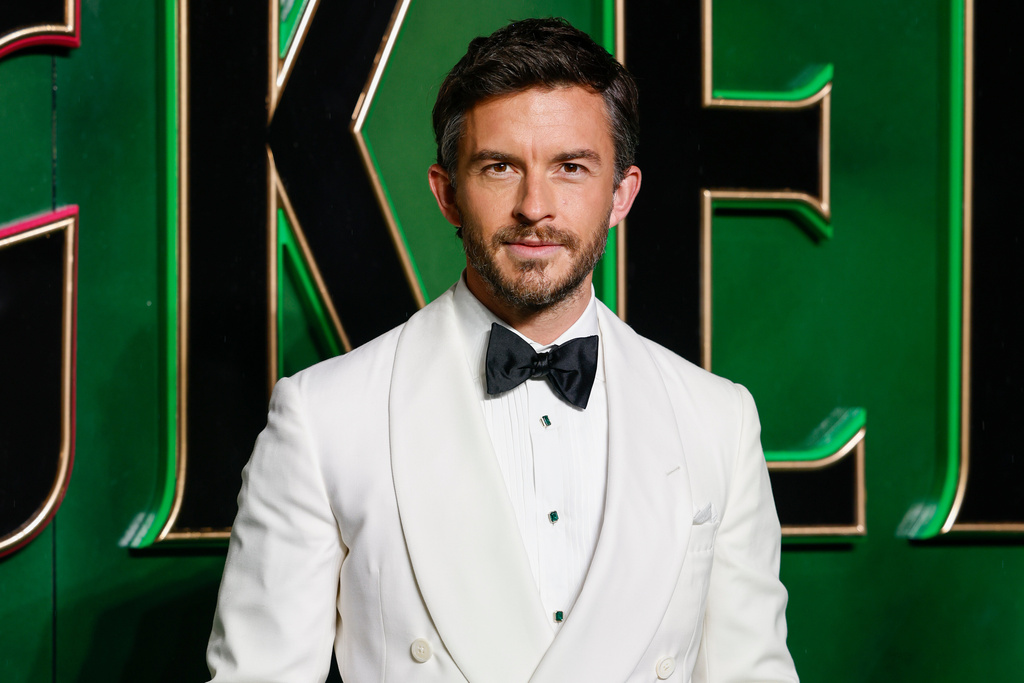 FILE - Jonathan Bailey poses for photographers upon arrival at the premiere of the film 'Wicked' Nov. 18, 2024, in London. (Photo by Millie Turner/Invision/AP, File)