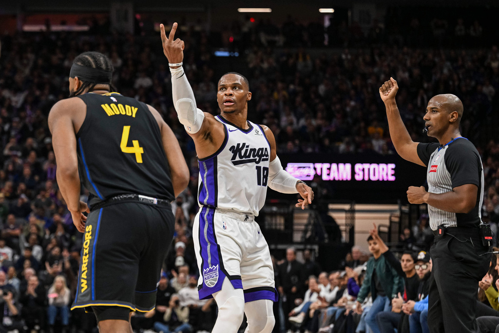 Sacramento Kings guard Russell Westbrook (18) reacts after making a 3-point shot during the first half of an NBA basketball game, Wednesday, Nov. 5, 2025, in Sacramento, Calif. (AP Photo/Justine Willard)