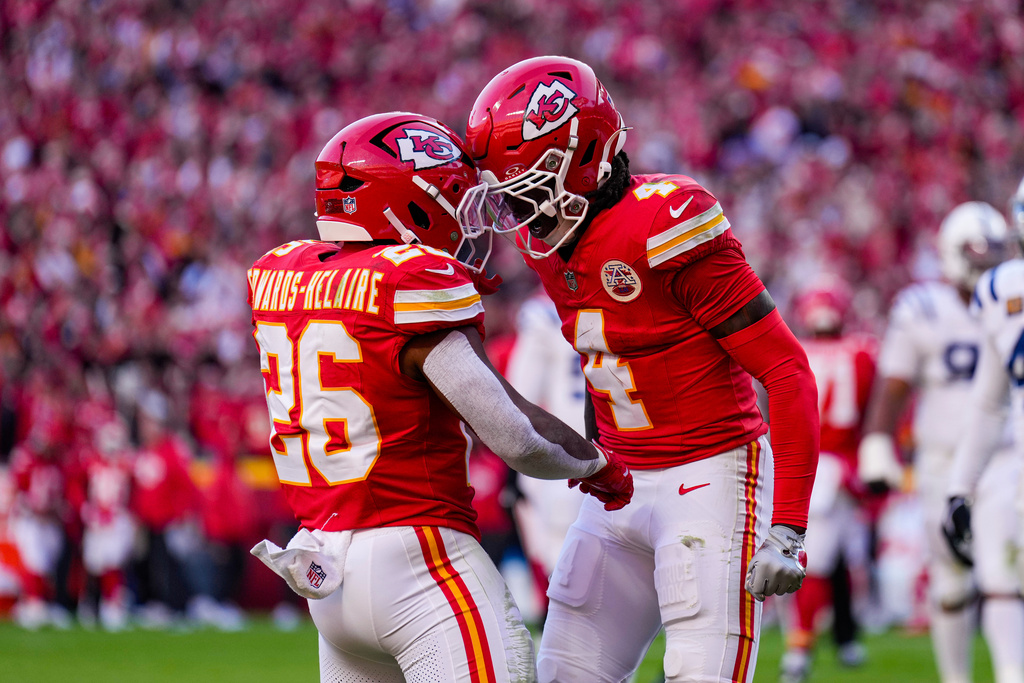Kansas City Chiefs wide receiver Rashee Rice (4) celebrates catch for a two-point conversion with running back Clyde Edwards-Helaire (26) during the second half of an NFL football game against the Indianapolis Colts Sunday, Nov. 23, 2025, in Kansas City, Mo. (AP Photo/Charlie Riedel)
