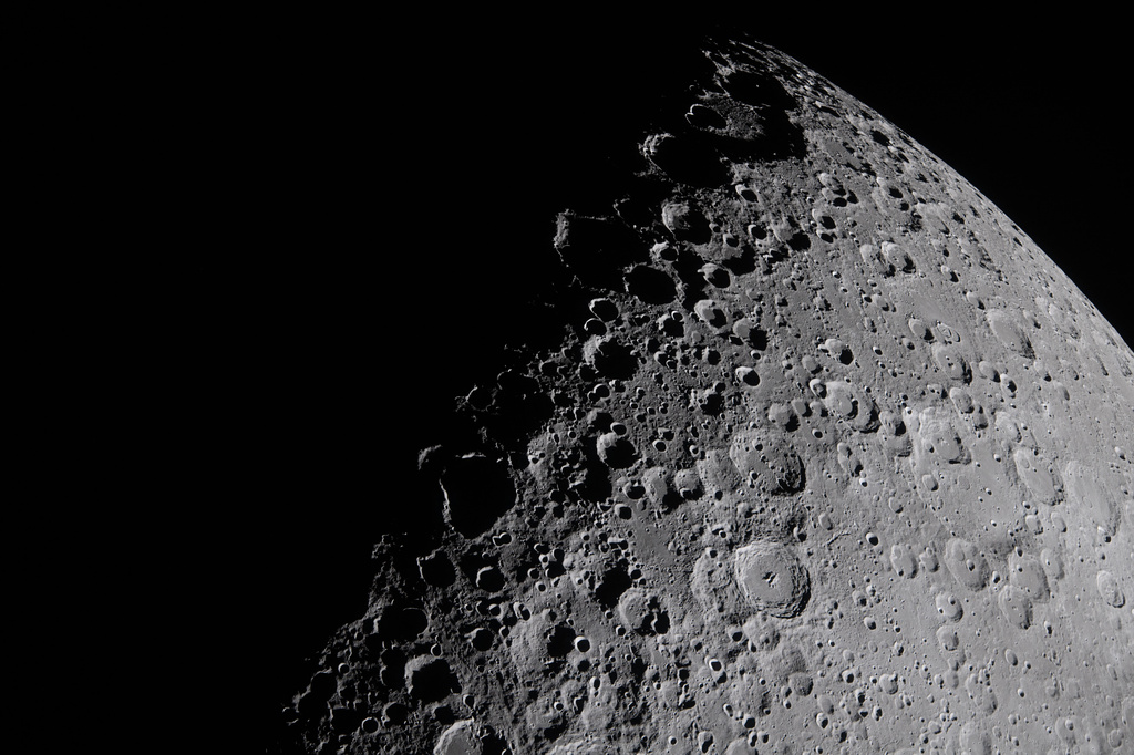 In this image provided by NASA, the Artemis II crew captured this image of a portion of the Moon coming into view along the terminator, the boundary between lunar day and night, during a lunar flyby, Monday, April 6, 2026. (NASA via AP)