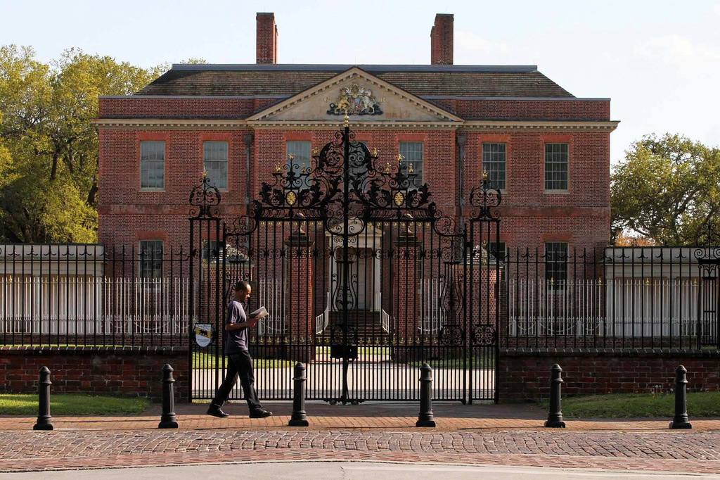 FILE - A man walks by Tryon Palace Historic Site in New Bern, N.C., March 27, 2020. (Gray Whitley/Sun Journal via AP, File)