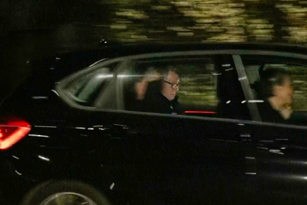 In this photo taken from video by Sky News, Britain's former ambassador to the U.S. Peter Mandelson is seen in a vehicle leaving a police station in London in the early hours of Tuesday, Feb. 24, 2026. (Sky News Exclusive via AP)