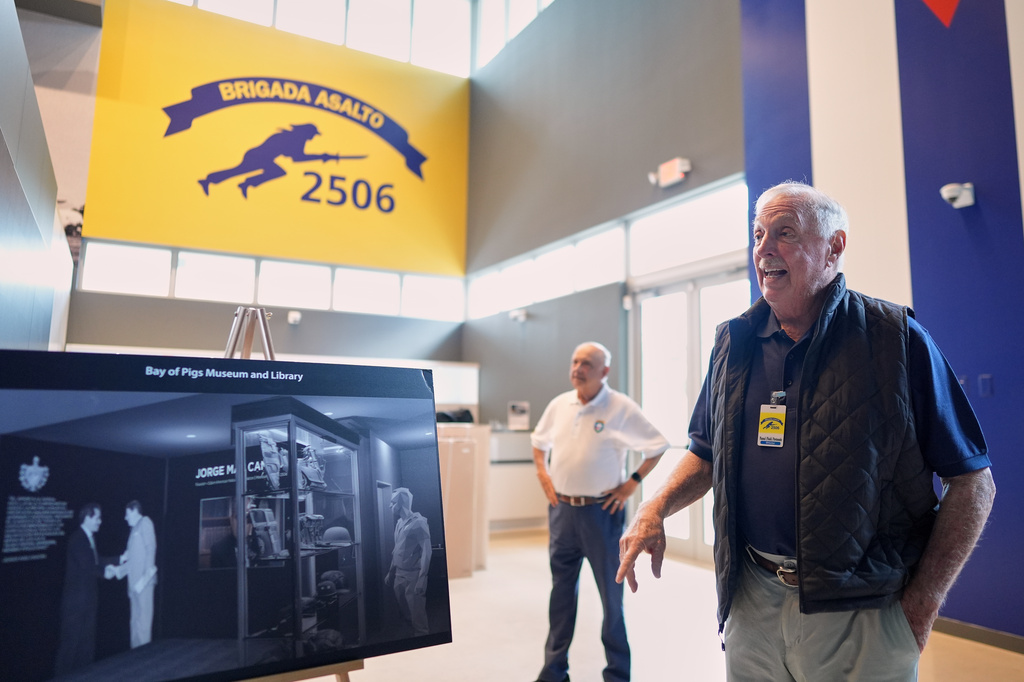 Bay of Pigs Invasion veterans Manuel Portuondo, right, and Ernesto Freyre participate in preparations for the reopening of the Bay of Pigs Museum in its new and larger space in Miami’s Little Havana neighborhood, Friday, March 20, 2026. (AP Photo/Rebecca Blackwell)