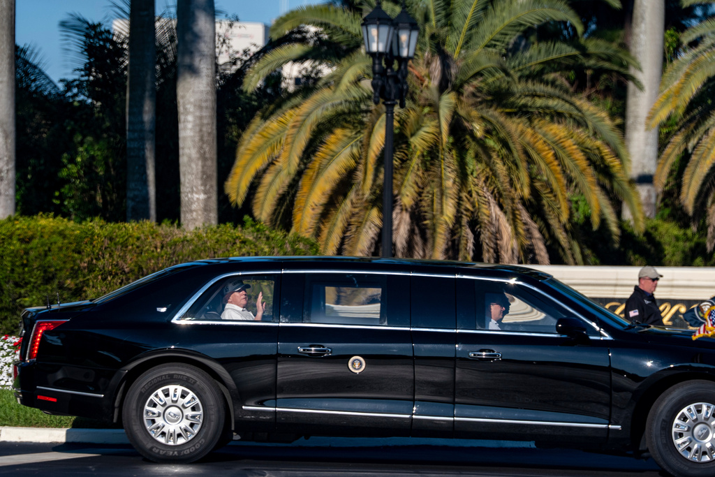 President Donald Trump waves as he departs Trump International Golf Club, Saturday, Dec. 27, 2025, in West Palm Beach, Fla. (AP Photo/Alex Brandon)