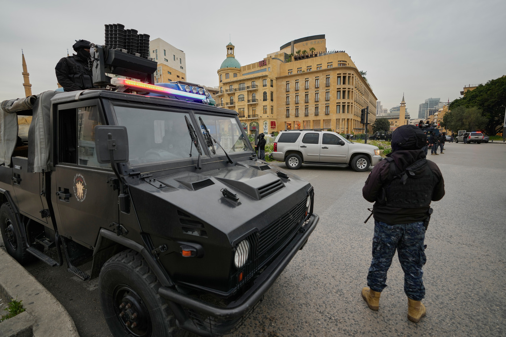 Special forces police officers deployed amid tensions between people displaced by Israeli strikes and local residents in Beirut neighborhoods, Lebanon, Wednesday, April 1, 2026. (AP Photo/Hussein Malla)