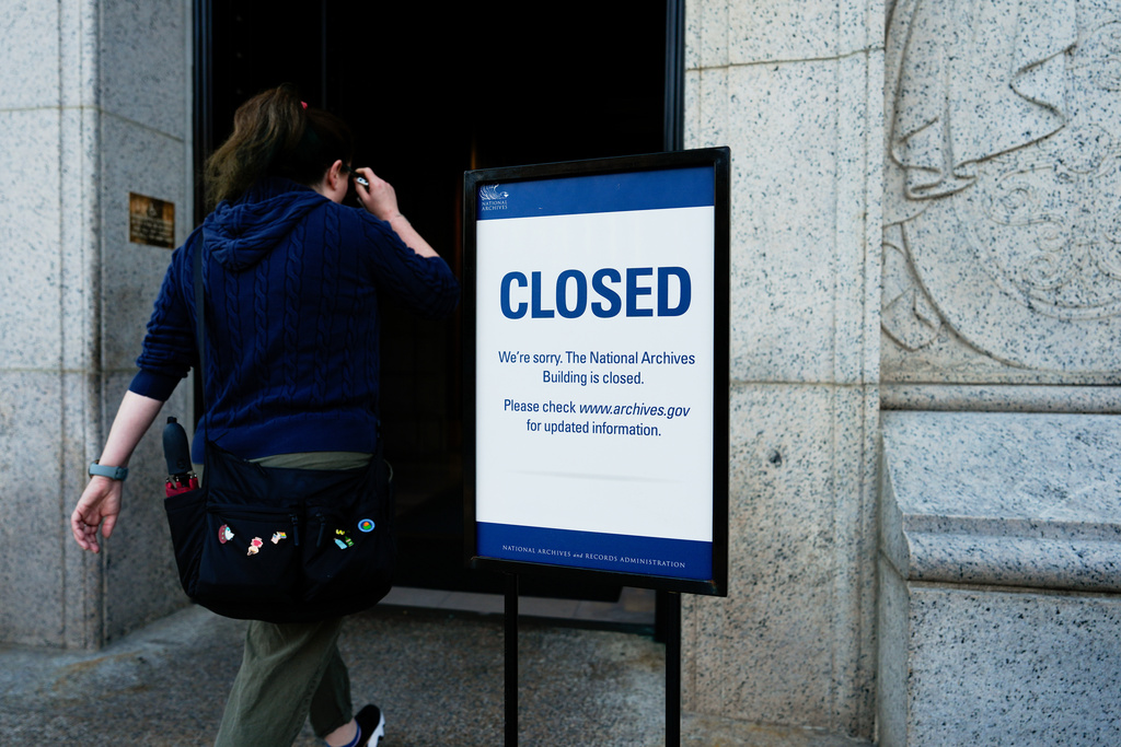 A closed sign stands in front of the National Archives on the first day of a government shutdown, Wednesday, Oct. 1, 2025, in Washington. (AP Photo/Julia Demaree Nikhinson)