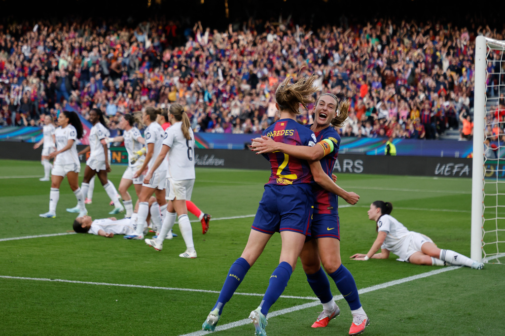 Barcelona's Irene Paredes celebrates after scoring her side's third goal during a Champions League quarterfinal soccer match between Barcelona and Real Madrid, in Barcelona, Spain, Thursday, April 2 2026. (AP Photo/Joan Monfort)