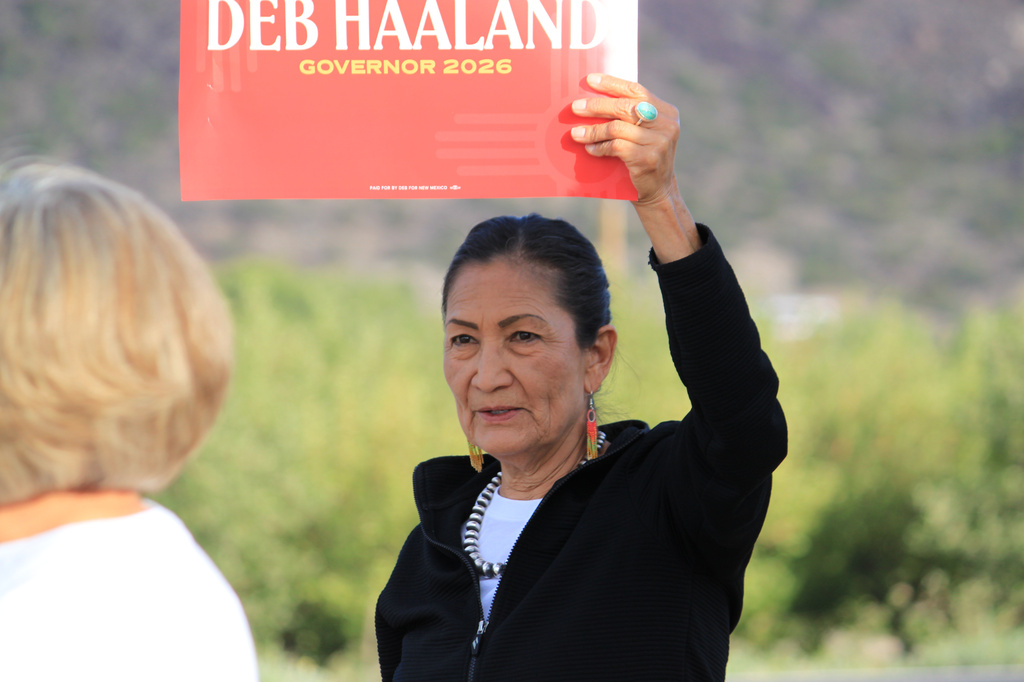 Democratic gubernatorial candidate Deb Haaland campaigns along a roadside in San Felipe Pueblo, N.M., on Tuesday, June 2, 2026. (AP Photo/Susan Montoya Bryan)