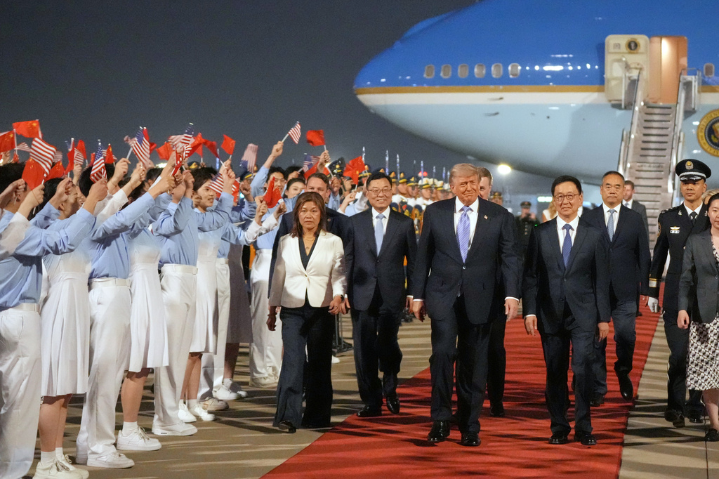 President Donald Trump walks with China's Vice President Han Zheng during a welcome ceremony Wednesday, May 13, 2026, at Beijing Capital International Airport in Beijing. (AP Photo/Mark Schiefelbein)