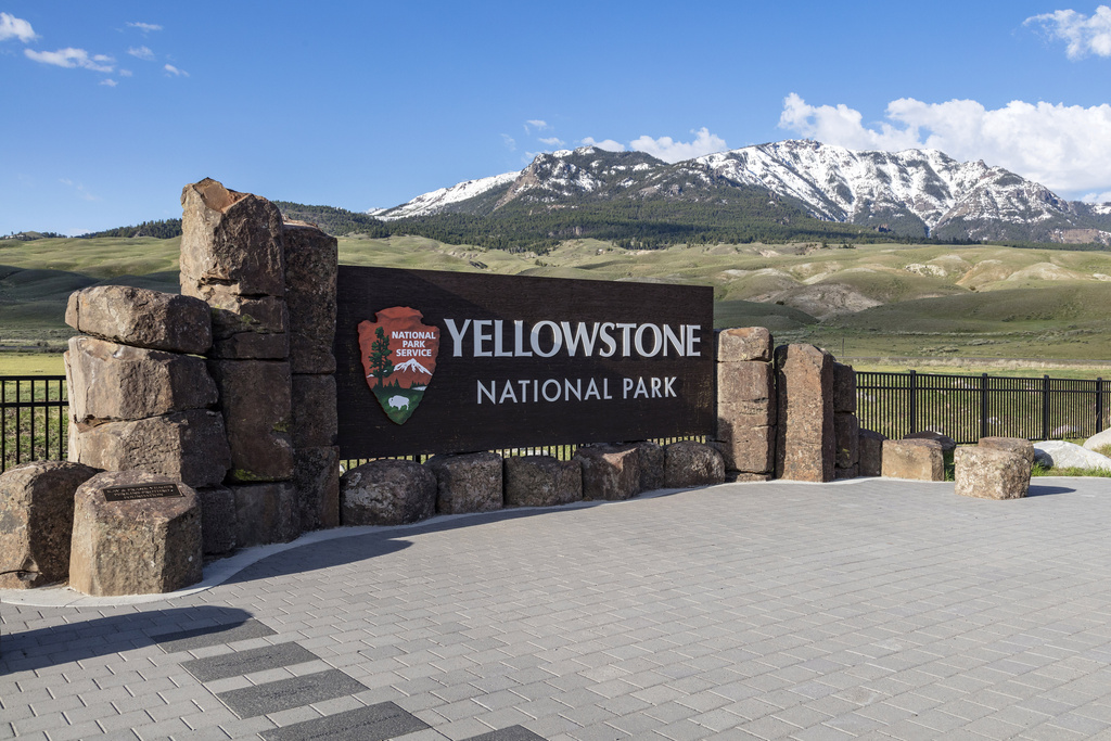 FILE - This photo provided by the National Park Service shows a sign marking the north entrance of Yellowstone National Park, May 7, 2018. (Jacob W. Frank/National Park Service via AP, File)