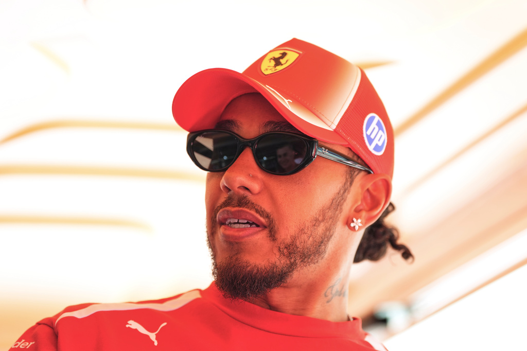 Ferrari driver Lewis Hamilton of Britain is pictured in the paddock ahead the Spanish Formula One Grand Prix, in Madrid, Spain, Thursday, Sept. 10, 2026. (AP Photo/Manu Fernandez)