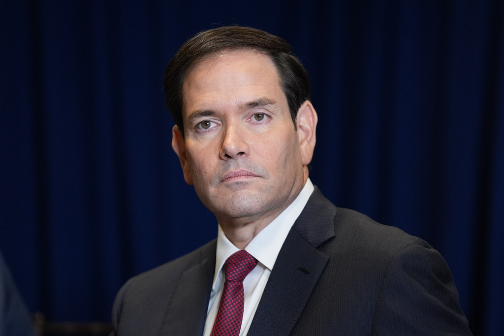 Secretary of State Marco Rubio listens as President Donald Trump meets with Argentine President Javier Milei during the United Nations General Assembly, Tuesday, Sept. 23, 2025, in New York. (AP Photo/Evan Vucci)