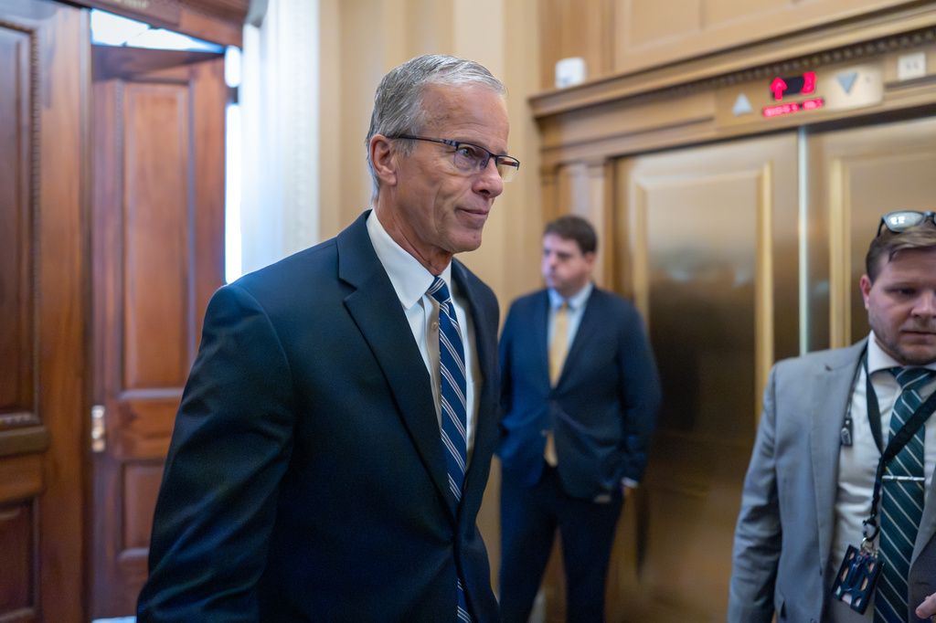 Senate Majority Leader John Thune, R-S.D., heads to the chamber before votes on the immigration enforcement funding package, at the Capitol in Washington, Thursday, June 4, 2026. (AP Photo/J. Scott Applewhite)