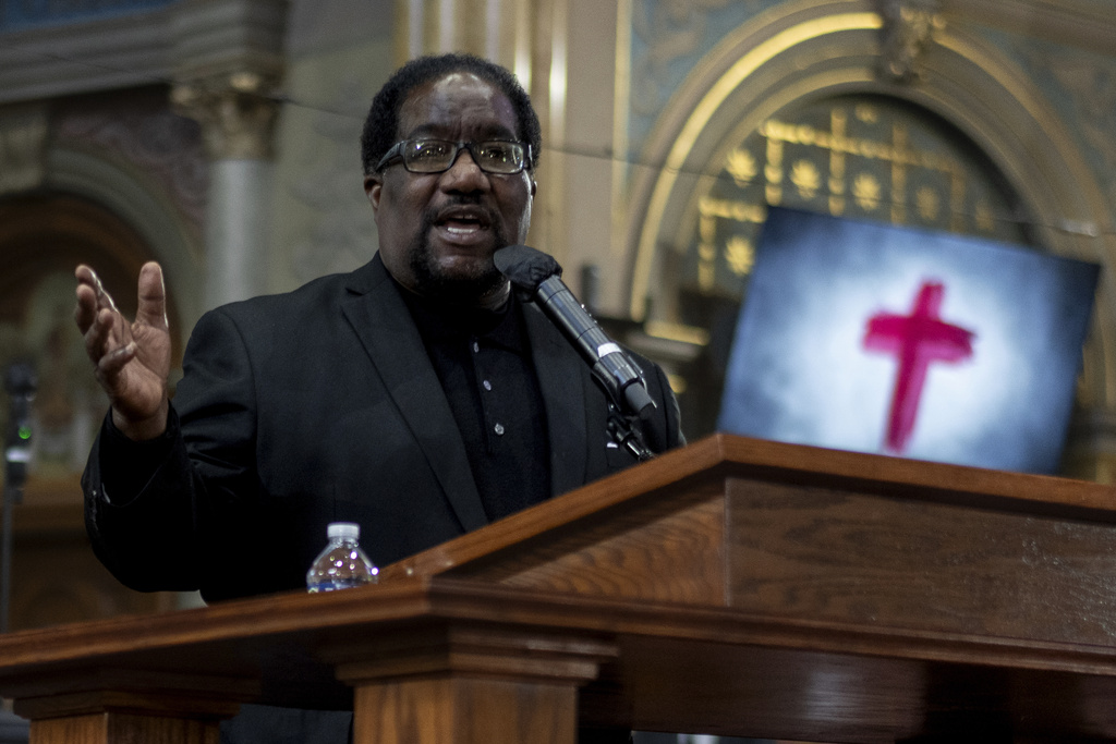 Rev. Dr. Marshall Elijah Hatch, Sr. Senior Pastor of the New Mount Pilgrim Missionary Baptist Church, preaches during a service at New Mount Pilgrim Missionary Baptist Church, Sunday, Sept. 7, 2025, in Chicago. (AP Photo/Carolyn Kaster)