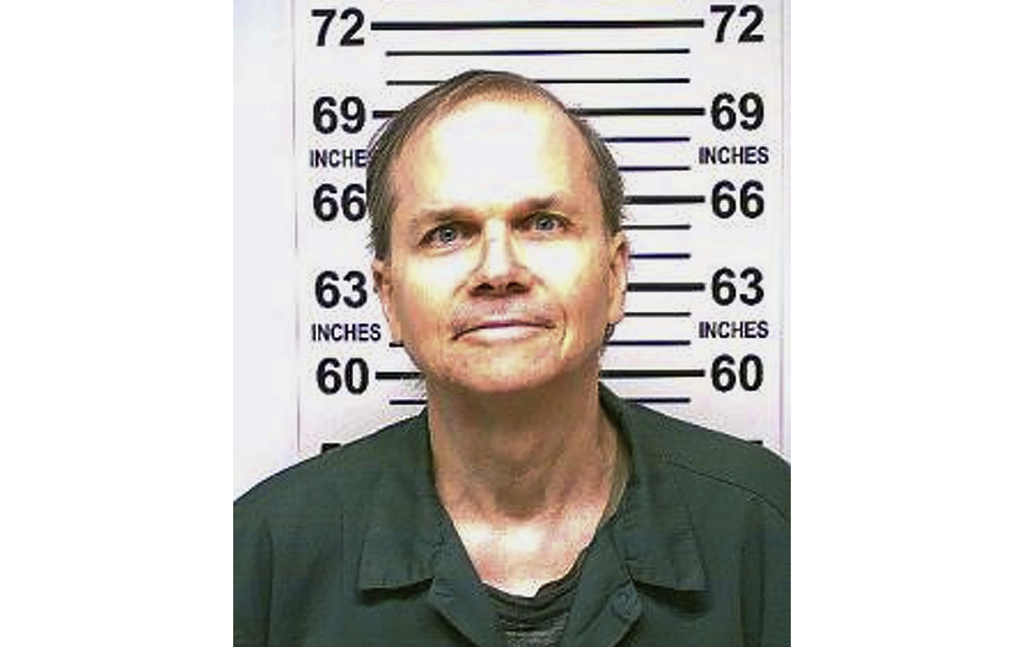 FILE - This photo provided by the New York State Department of Corrections shows Mark David Chapman, the man who shot and killed John Lennon outside his Manhattan apartment building in 1980, Jan. 31, 2018. (New York State Department of Corrections via AP, File)