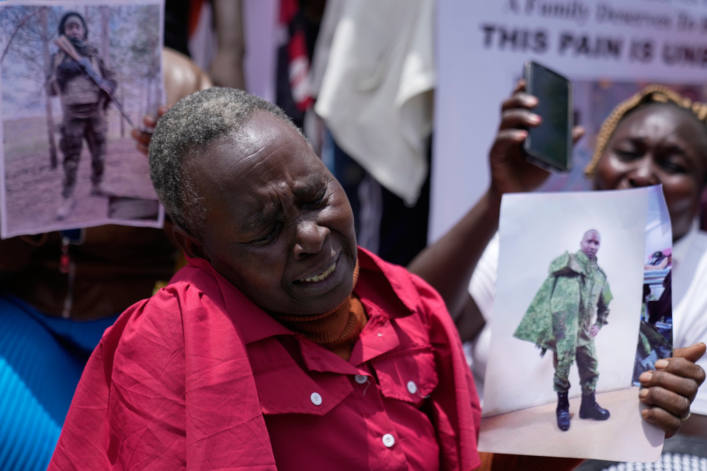 A woman whose relative joined the Russian army to fight in Ukraine weeps during a protest calling for their repatriation in Nairobi, Kenya, Thursday, March 5, 2026. (AP Photo/Brian Inganga)