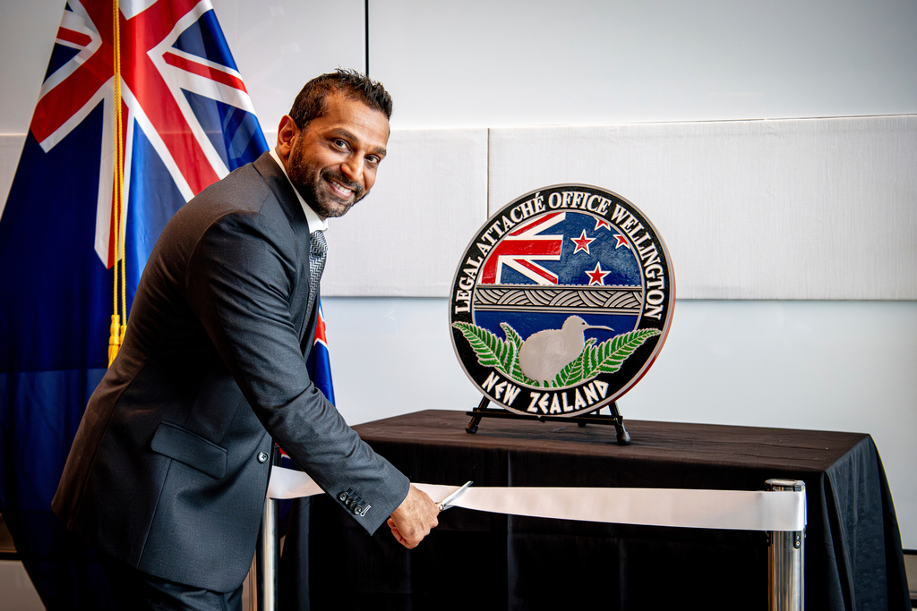 FILE - In this photo released by the US Embassy in Wellington, New Zealand, FBI Director Kash Patel cuts the ribbon at the official opening of the FBI office in Wellington, New Zealand, July 31, 2025. (Ola Thorsen/US Embassy via AP, File)