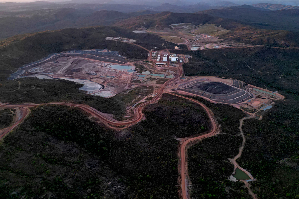 FILE - A mine operated by Serra Verde Mining digs for rare earth elements including neodymium, praseodymium, terbium and dysprosium, which are essential for the production of permanent magnets, in Minacu, Goias state, Brazil, July 28, 2025. (AP Photo/Eraldo Peres, File)