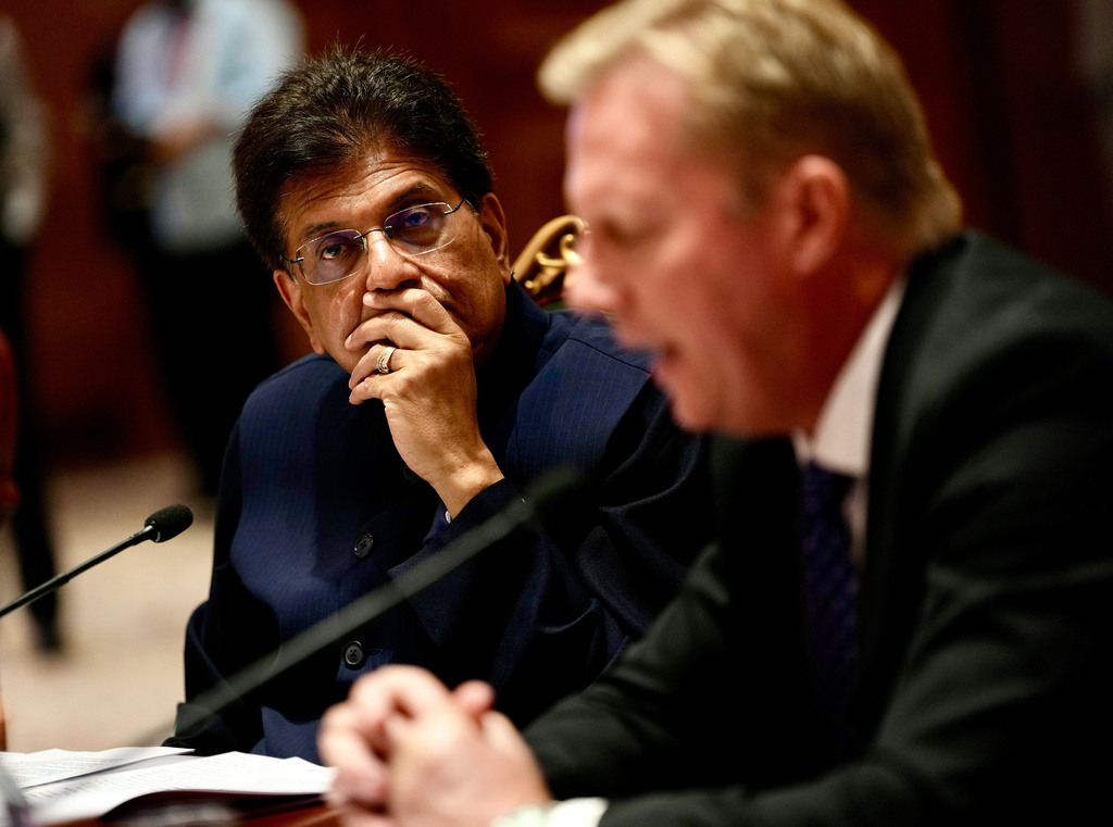 Indian Commerce Minister Piyush Goyal listens as New Zealand Trade Minister Todd McClay delivers his speech during the India New Zealand Free Trade Agreement signing ceremony and Business forum meeting in New Delhi, India, Monday, April 27, 2026. ( AP Photo/Manish Swarup)