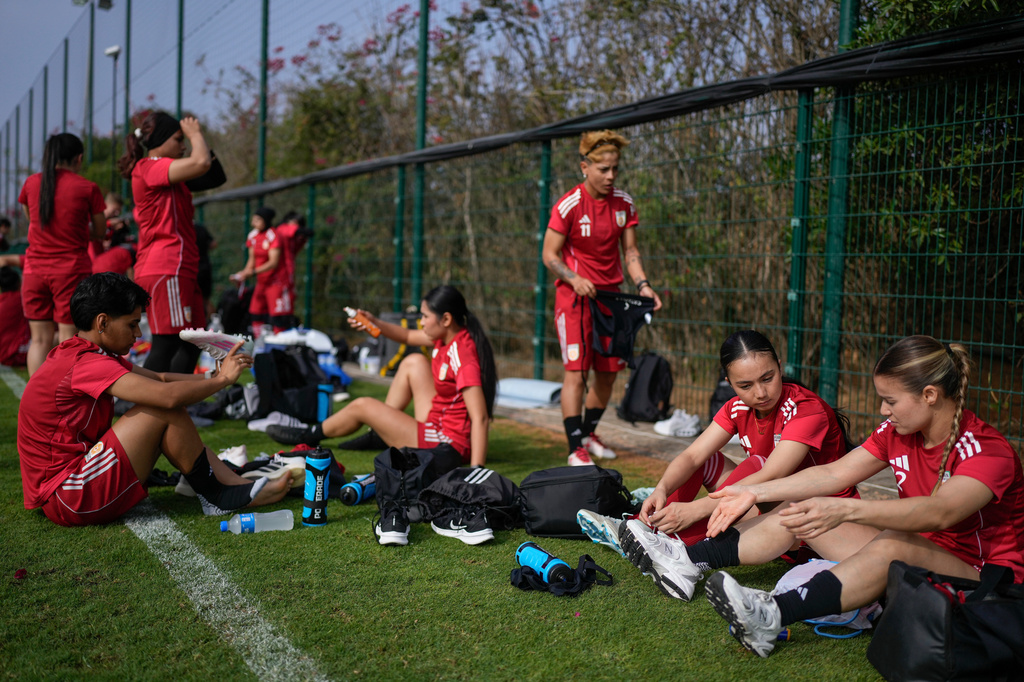 Members of Afghan Women United soccer team prepare for a training ahead of their first international tournament since fleeing their country, in Casablanca, Morocco, Saturday, Oct. 25, 2025. (AP Photo/Mosa'ab Elshamy)