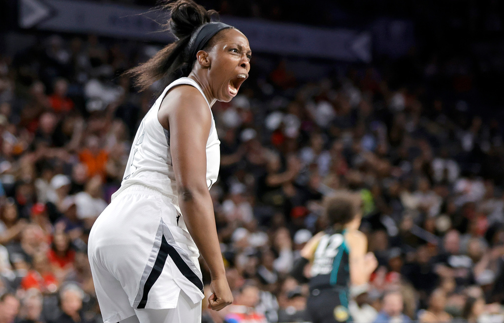 Las Vegas Aces guard Chelsea Gray (12) reacts after making a basket against the Los Angeles Sparks during the first half of an WNBA basketball game Tuesday, Sept. 22, 2026, in Las Vegas. (Steve Marcus/Las Vegas Sun via AP)