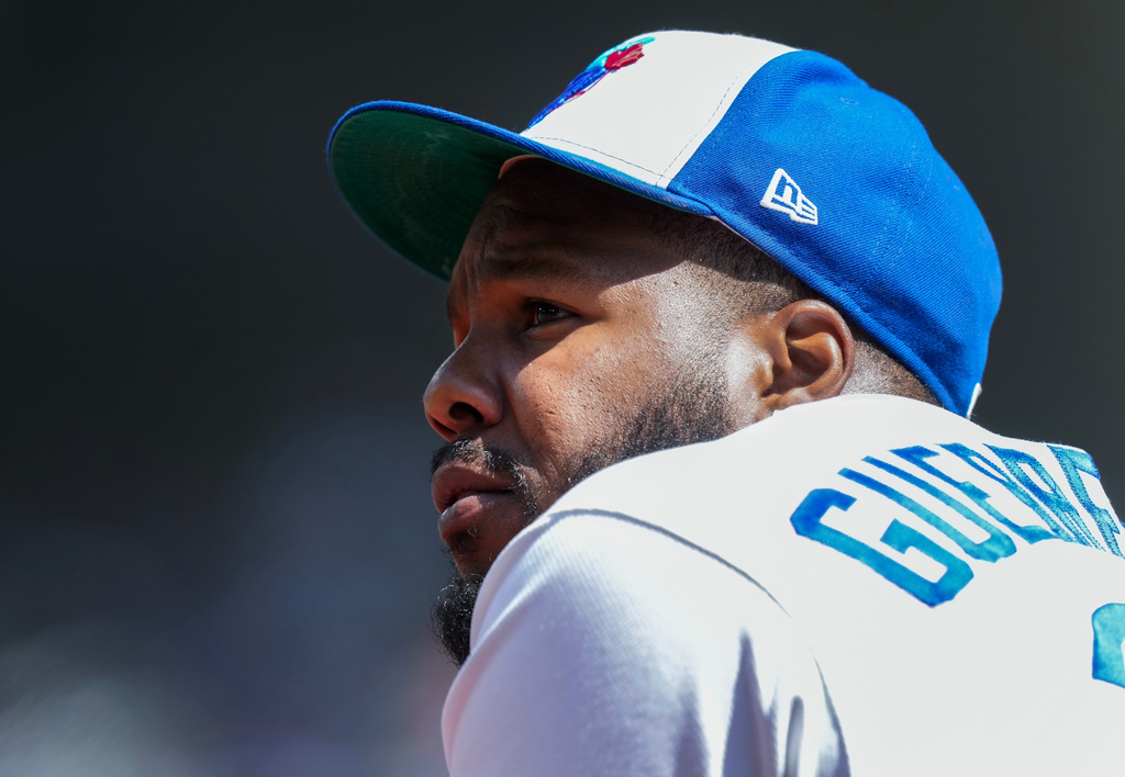 Toronto Blue Jays' Vladimir Guerrero Jr. looks on from the dugout after striking out in his first at bat against the Tampa Bay Rays during the first inning of a baseball game in Toronto, Thursday, July 23, 2026. (Nathan Denette/The Canadian Press via AP)