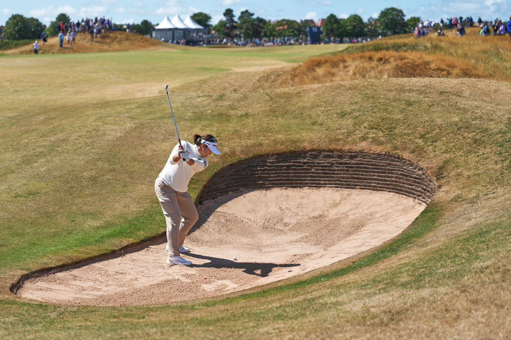 Haeran Ryu, of South Korea, plays a shot out of a bunker on the 15th hole during the first round of the Women's British Open golf championship in Lytham St Annes, England, Thursday, July 30, 2026. (AP Photo/Jon Super)