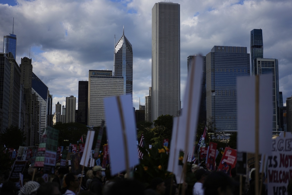 People march during Illinois Coalition for Immigrant & Refugee Rights' "Chicago Says No Trump No Troops" protest Saturday, Sept. 6, 2025, in Chicago. (AP Photo/Carolyn Kaster)