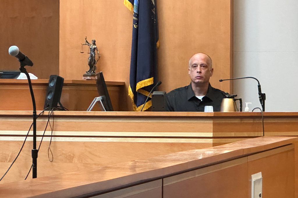 This photo taken with a smartphone shows David Meehan testifying during Jeffrey Buskey's trial in Manchester, N.H., Monday, Sept. 14, 2026. (AP Photo/Holly Ramer)