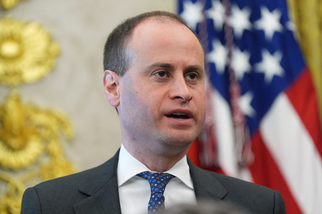 White House staff secretary Will Scharf speaks during an event with President Donald Trump in the Oval Office of the White House, Thursday, Aug. 6, 2026, in Washington. (AP Photo/Alex Brandon)