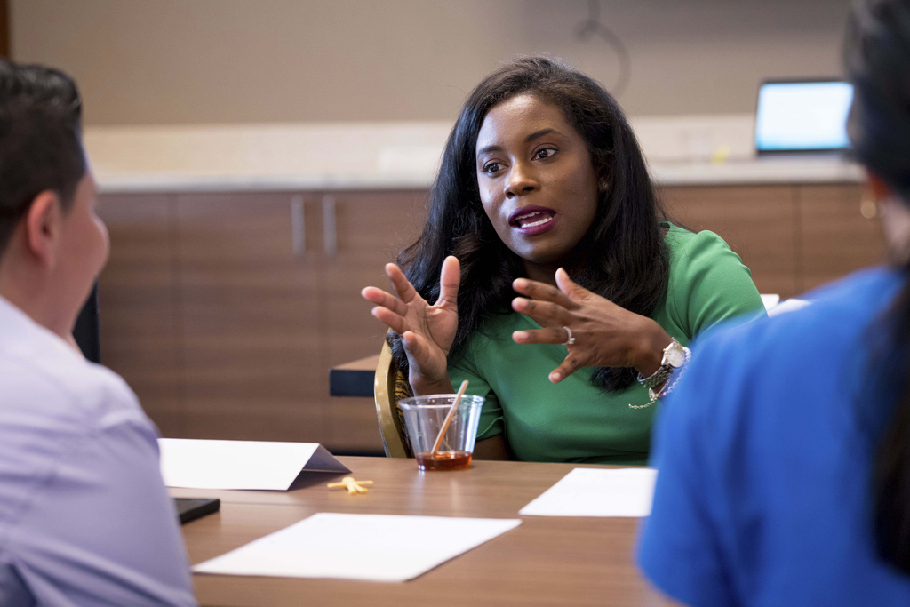 Kaitlyn Joshua talks about public speaking at the Emerge America Southern Regional Boot Camp, a camp designed for Democratic women to improve their political campaigns, in New Orleans, Aug. 10, 2025. (AP Photo/Matthew Hinton)